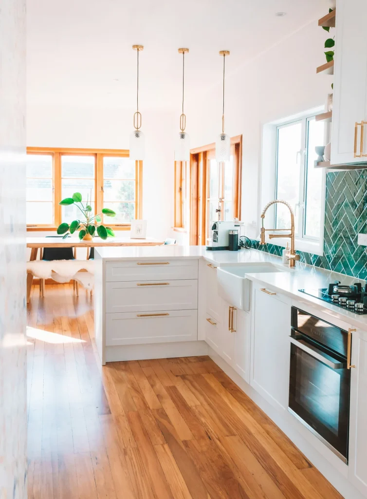 [PLACEHOLDER — client project photo] Coastal kitchen with white cabinetry
