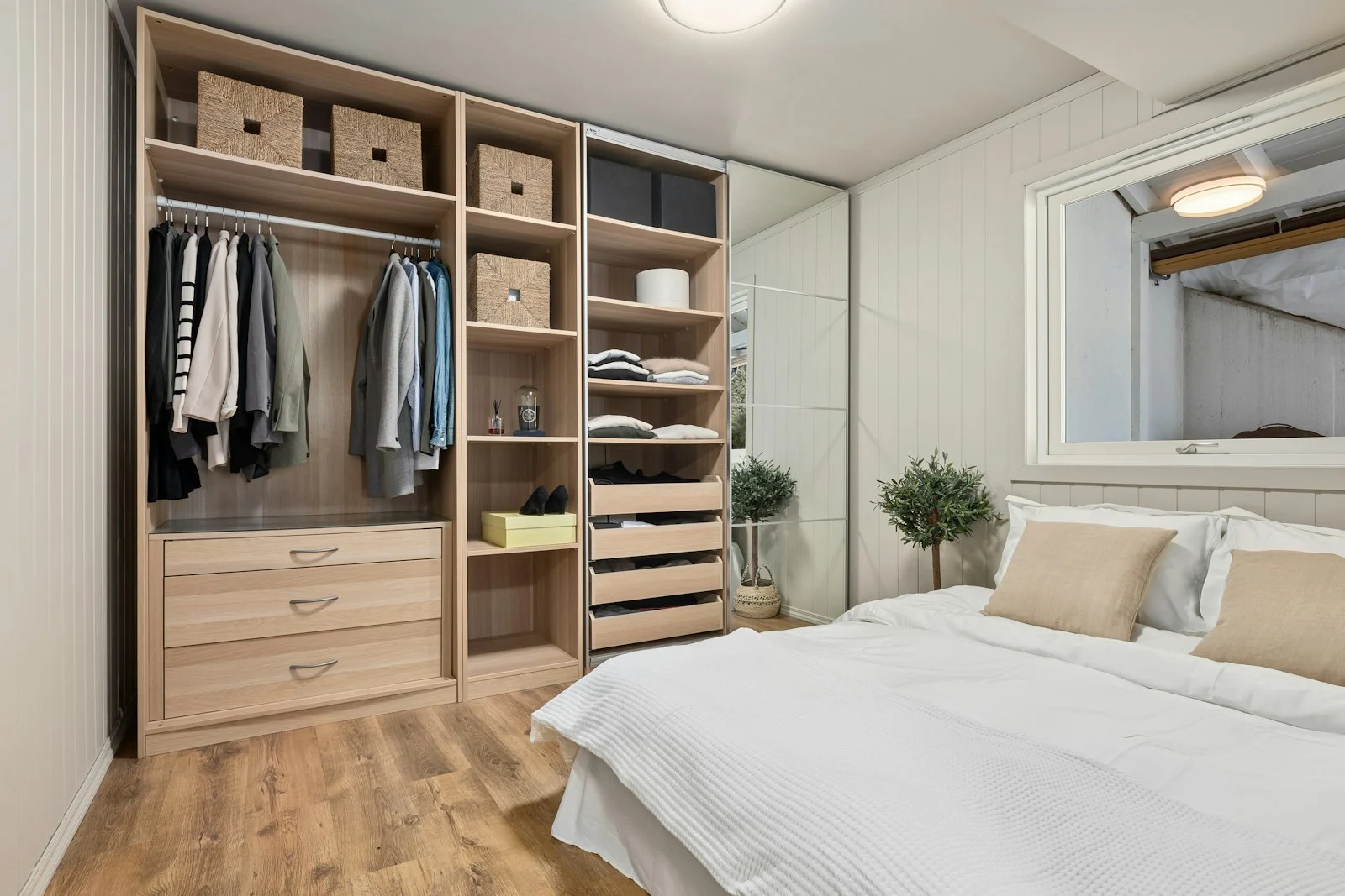 [PLACEHOLDER — client project photo] Reach-in closet system in warm white